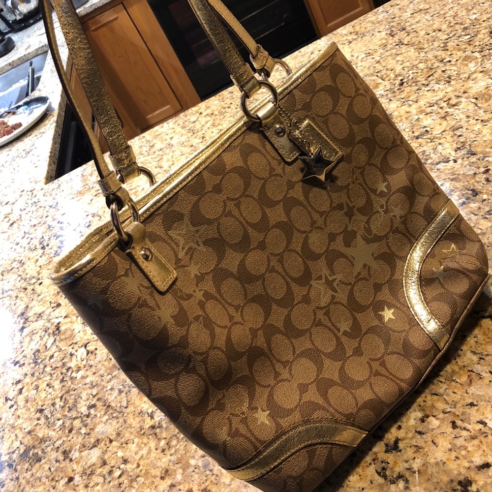 Gold star coach purse